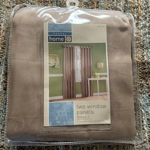 One pair of tab top curtains. 2 panels, 84x84.